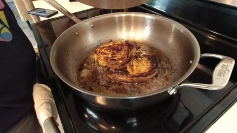 Editorial meat in a pan searing while lid is being open then closed Stock-Footage 264681073