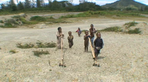 Editorial, Native boys and their toys Stock Footage 368571