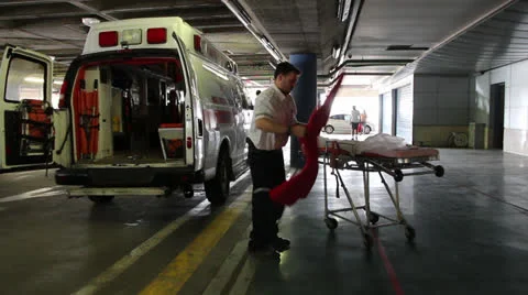 Editorial Paramedic prepares stretcher Stock Footage 23713182