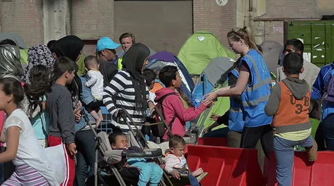 EDITORIAL:  The queue of hungry Syrian refugees for food in a camp for refugees Stock Footage 62297285