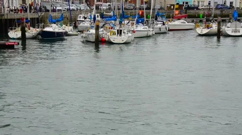 Editorial shot of fishing boat returning to Weymouth harbour Stock Footage 59761046