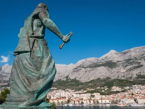Editorial - Statue of Saint Peter with key in front of city Makarska in Croat Stock Photos