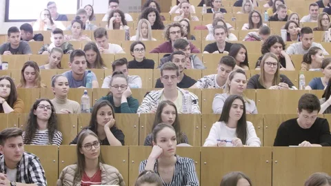 Editorial Students attending a class in the college lecture room front Video stock 116016767