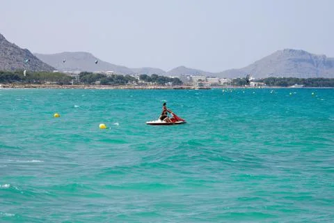 EDITORIAL: Three ladies on a paddle boat during holidays in Alcudia bay Stock Photos