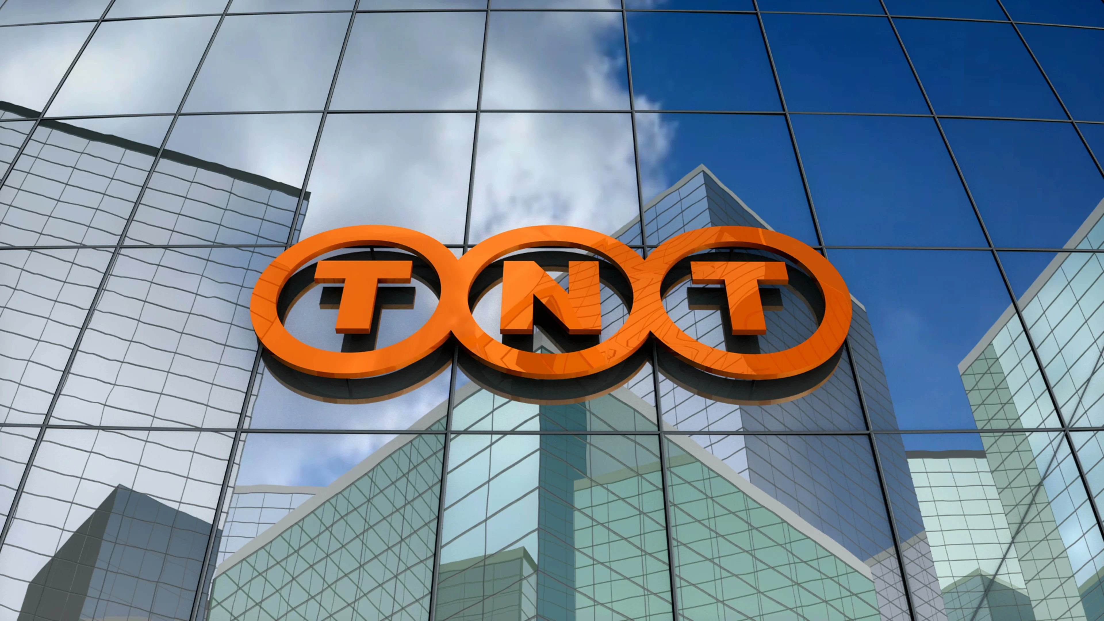 Editorial, TNT Express logo on glass bu... | Stock Video | Pond5