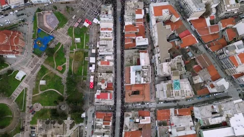 Editorial Top-down Aerial of Xanthi Carnival Parade through City Streets, Greece Stock-Footage 332772990