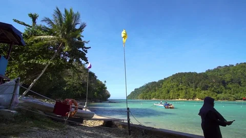Editorial: Tourist enjoy at the beach at Sapi Island, Malaysia. Stock Footage 102753932