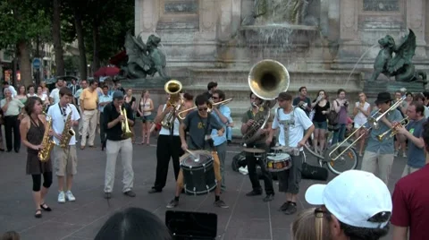 An editorial use only shot of Paris street dancers and musical performers. Stock Footage 8681374