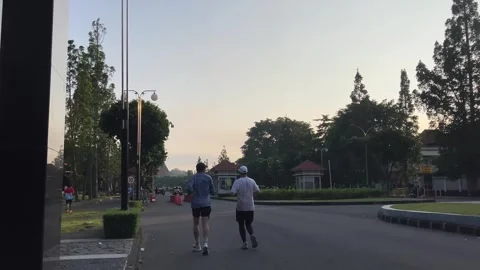 Editorial Video of People Jogging Around Gadjah Mada University Campus Stock-Footage 337230669