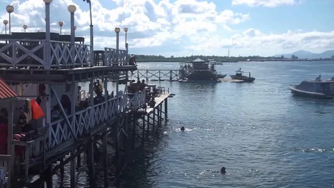 Editorial : Visitor enjoy jump and swim in clear crystal water sea. Stock Footage 110827367