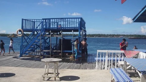 Editorial: Visitor enjoy jumping and swimming at recreational water park Stock Footage 110827207