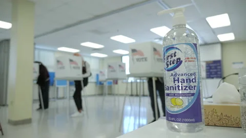 Editorial: Voting During The Pandemic - Hand Sanitizer In Voting Room Stock Footage 142010867