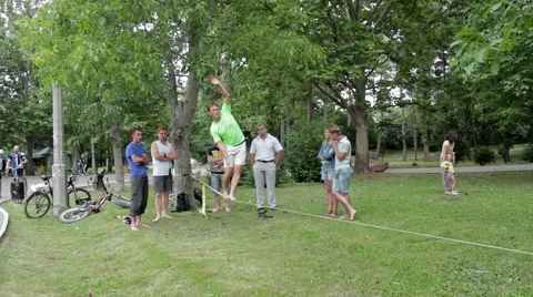 Editorial. Walking on the tight rope Stock-Footage 53198690
