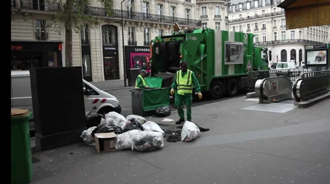 EDITORIAL: Workers collecting garbage. Stock Footage 34412306