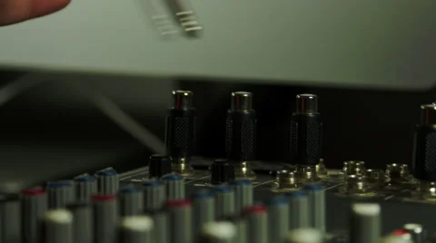 Editor's Hand Inserting A Jack Into Sound Mixer And Adjusting Sound Levels, Tilt Stock Footage 50550935