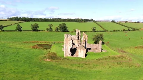 Edlingham Castle Ruins, orbit, tracking shot showing castle and scenery Video stock 132289830