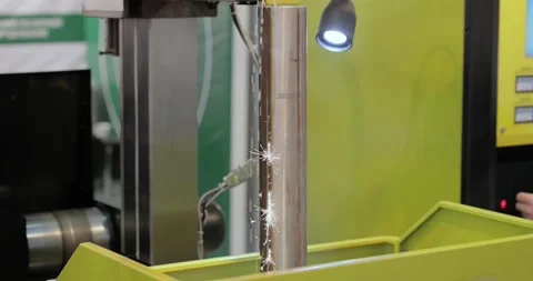 EDM CNC machine while cutting the sample work pieces. Cutting metal modern pr Stock Footage 202175290