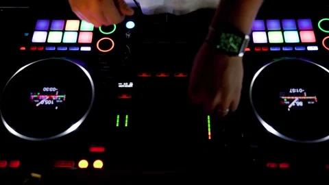 EDM DJ working at underground rave pressing Stock Footage 251975907