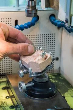 EDM machine for denture Stock Photos