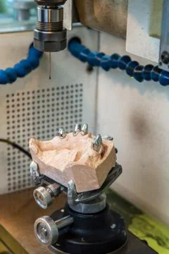 EDM machine for denture Stock Photos