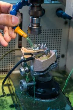 EDM machine for denture Stock Photos