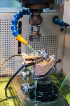 EDM machine for denture Stock Photos