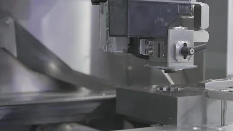EDM Wire cutting machine working, Closeup Wire Electrical Discharge Machining Stock Footage 337543620