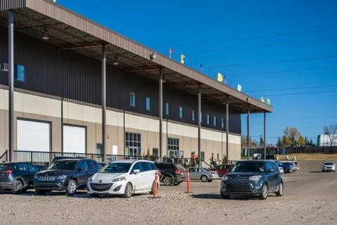 Edmonton, AB - Oct 2, 2020: Front entrance and parking to Bountiful Farmers'  Stock Photos