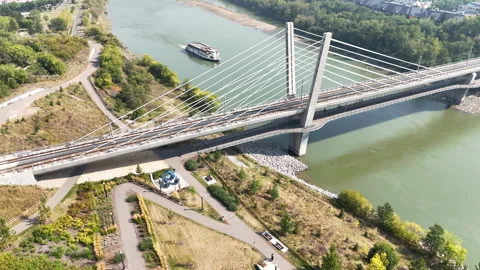 Edmonton metro cable-stayed bridge over a river  Stock Footage 316086287