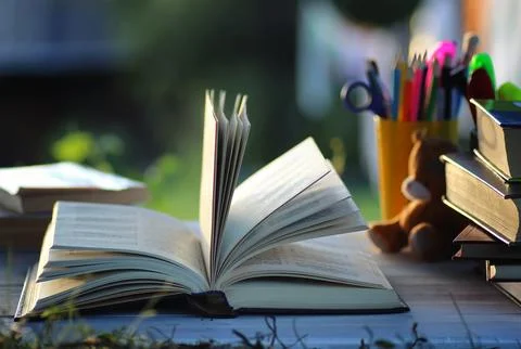 Educaion back school book stack page outdoor Stock Photos