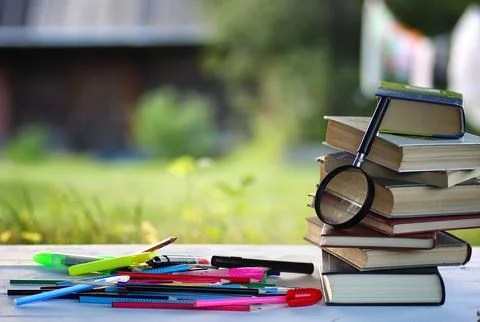 Educaion back school book stack page outdoor Stock Photos