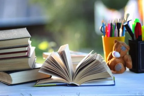 Educaion back school book stack page outdoor Stock Photos