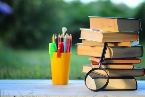 Educaion back school book stack page outdoor Stock Photos