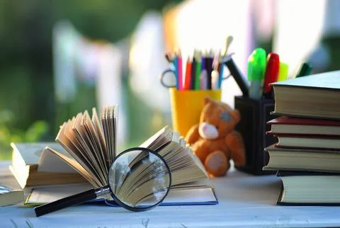 Educaion back school book stack page outdoor Stock Photos