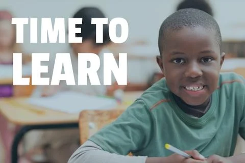Education and time to learn text and happy boy sitting at a class Fotos Stock