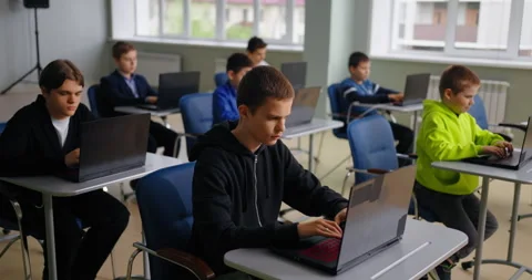 Education For Children, Teens Boys In Programming, Pupils With Laptops In Stock Footage 280179175