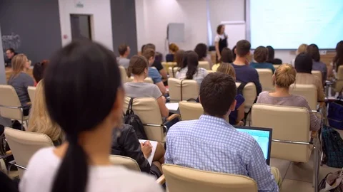 Education classroom blur background of university students sitting in a lecture Stock Footage