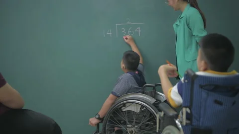 Education concept of 4k Resolution. Asian boy solves math problems on blackbo Stock Footage 150985286