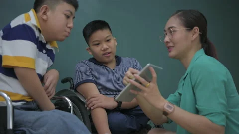 Education concept of 4k Resolution. Young teacher teaching children with disa Stock Footage 149213590