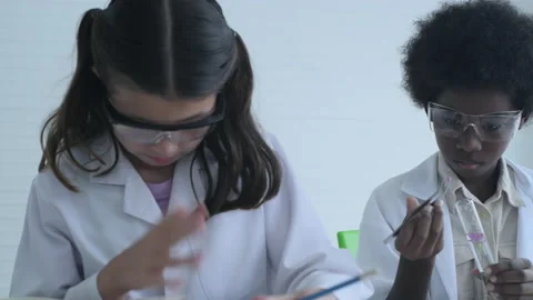 Education concept of 4k Resolution. Young students are experimenting with kno Stock Footage 198202076