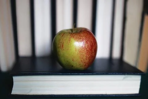 Education concept books stack, apple and pen textbooks to prepare for the ... Stock Photos