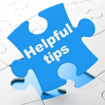 Education concept: Helpful Tips on puzzle background Illustrazione stock