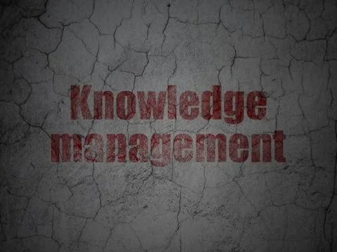 Education concept: Knowledge Management on grunge wall background Illustrazione stock
