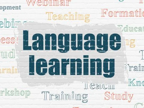 Education concept: Language Learning on wall background Illustrazione stock