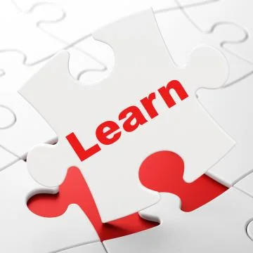 Education concept: Learn on puzzle background Illustrazione stock