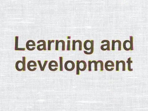 Education concept: Learning And Development on fabric texture background Illustrazione stock