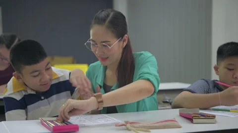 Education concept. The teacher is teachi... | Stock Video | Pond5