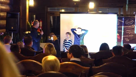 Education event - presenting something to group of kids at educational event Stock Footage 107874105