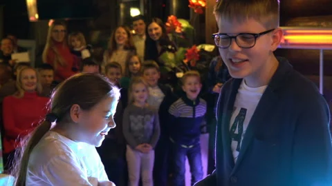 Education event - presenting something to group of kids at educational event Stock Footage 107874595