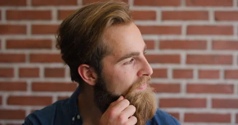 Education, face and thinking with student on brick wall background at college Stock Footage 336644288